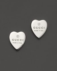 From the Trademark collection comes this gorgeous engraved heart stud earring designed by Gucci. From the Trademark collection comes this gorgeous engraved heart stud earring designed by Gucci.
