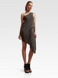 Soft matte jersey draped from shoulder to hem an in asymmetrical one-shoulder silhouette.Single shoulder strapSingle spaghetti strapDraped bodiceAsymmetrical hemAbout 26 from natural waistCuproDry cleanMade in USA of Italian fabricModel shown is 5'9½ (176cm) wearing US size Small. Soft matte jersey draped from shoulder to hem an in asymmetrical one-shoulder silhouette.Single shoulder strapSingle spaghetti strapDraped bodiceAsymmetrical hemAbout 26 from natural waistCuproDry cleanMade in USA of Italian fabricModel shown is 5'9½ (176cm) wearing US size Small.