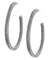 Total glamour. 2028's stunning hoops feature an intricate textured design accented by imitation marcasite stones. Set in silver tone mixed metal with a post backing. Approximate diameter: 1-3/4 inches.