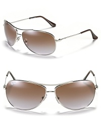 Classic aviator sunglasses with a sleek double bridge design and gradient lenses lend a iconic style to any ensemble. Classic aviator sunglasses with a sleek double bridge design and gradient lenses lend a iconic style to any ensemble.