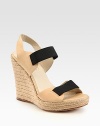 Comfy-chic espadrille wedge accompanied by soft leather straps and contrasting elastic trim. Braided hemp wedge, 4 (100mm)Braided hemp platform, 1 (25mm)Compares to a 3 heel (75mm)Elastic and leather upperLeather lining and solePadded insoleImported