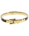 Captivating hues lend instant elegance. This Michael Kors bangle bracelet boasts tortoise acetate over gold tone steel. Finished with a buckle closure. Approximate diameter: 2-1/4 inches.