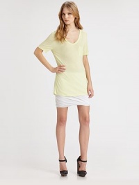 Dropped shoulders and a patch pocket enhance this lengthy, lightweight v-neck. Rounded v-neckDropped shouldersShort sleevesFront patch pocketLonger length hits below the hipsRayonHand washImportedModel shown is 5'9½ (176cm) wearing US size Small. Dropped shoulders and a patch pocket enhance this lengthy, lightweight v-neck. Rounded v-neckDropped shouldersShort sleevesFront patch pocketLonger length hits below the hipsRayonHand washImportedModel shown is 5'9½ (176cm) wearing US size Small.