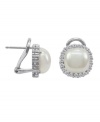 Look positively luminous in sparkling studs. Majorica earrings feature an organic, man-made pearl (9 mm) with a chic, cubic zirconia accented jacket. Setting and post crafted in sterling silver.