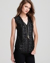 Flaunt modern edge in this futuristic Sachin + Babi top, embellished with sequins for statement shine.