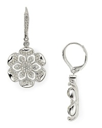 Nadri's drop earrings glitter with pretty pave flowers. These dainty danglers add the finishing touch to dressy looks. Nadri's drop earrings glitter with pretty pave flowers. These dainty danglers add the finishing touch to dressy looks.
