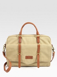 Both trim and roomy, in rugged leather-trimmed canvas, perfectly sized to protect your computer and hold a few other essentials as well.Double top handlesDetachable padded shoulder strapTop zip closeOutside buckle-strap flap pocketInside computer compartment and zip pocketCotton lining15W X 10H X 2DImported