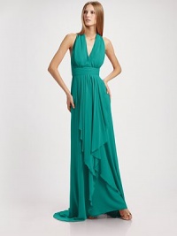 Stunning goddess inspired design, crafted from airy silk chiffon with a dramatically draped front and a sultry cutout back.Halter straps with back closure Deep V neckline Ruched waist Pleated draping at the skirt Cutout back with spaghetti straps About 49 from natural waist Silk Dry clean Imported Stunning goddess inspired design, crafted from airy silk chiffon with a dramatically draped front and a sultry cutout back.Halter straps with back closure Deep V neckline Ruched waist Pleated draping at the skirt Cutout back with spaghetti straps About 49 from natural waist Silk Dry clean Imported
