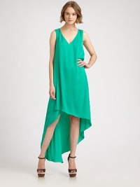 Vibrant and draped with a daring asymmetric hem that offers a hint of leg-baring chic. Loose fitV-neckSleevelessFlat frontAbout 21 from natural waistPolyesterDry cleanImportedModel shown is 5'10 (177cm) wearing US size Small. Vibrant and draped with a daring asymmetric hem that offers a hint of leg-baring chic. Loose fitV-neckSleevelessFlat frontAbout 21 from natural waistPolyesterDry cleanImportedModel shown is 5'10 (177cm) wearing US size Small.
