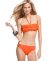 Wear it as a halter or strapless bandeau, this Kenneth Cole Reaction bikini top makes style waves with feminine tiered ruffles!