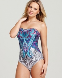 A saturated paisley print fades to black on Gottex's Folklore one piece, boasting a flattering strapless sweetheart neckline. A saturated paisley print fades to black on Gottex's Folklore one piece, boasting a flattering strapless sweetheart neckline.