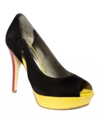 Hey there, show stopper. The bright reptilian print of Marc Fisher's Tumble platform pumps contrasts nicely with the smooth suede upper. An unexpected red heel will leave them wanting more. Hey there, show stopper. The bright reptilian print of Marc Fisher's Tumble platform pumps contrasts nicely with the smooth suede upper. An unexpected red heel will leave them wanting more.