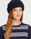 An allover swirl detail accents this classic beret style for an unexpected finish.WoolOne size fits mostSpot cleanImported