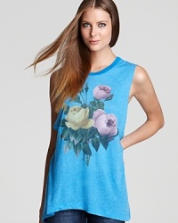 A floral print with a vintage look adorns the front of this WILDFOX muscle tank. A floral print with a vintage look adorns the front of this WILDFOX muscle tank.
