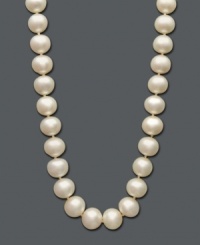 The perfect gift of timeless beauty. This versatile strand of cultured freshwater pearls (11-12 mm) comes in a 14k gold setting. Approximate length: 18 inches.