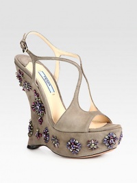 Beaded suede design with a powerful wedge and adjustable ankle strap. Self-covered wedge, 6 (150mm)Covered platform, 1¾ (45mm)Compares to a 4¼ heel (110mm)Suede upperAdjustable ankle strapLeather lining and solePadded insoleMade in Italy Beaded suede design with a powerful wedge and adjustable ankle strap. Self-covered wedge, 6 (150mm)Covered platform, 1¾ (45mm)Compares to a 4¼ heel (110mm)Suede upperAdjustable ankle strapLeather lining and solePadded insoleMade in Italy