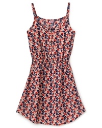 This floral printed dress is stylish and so easy to wear whether she's lazing in the grass or playing games at the picnic. This floral printed dress is stylish and so easy to wear whether she's lazing in the grass or playing games at the picnic.