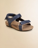Sandals with double grip-tape closure and logo detail in plush leather.Double grip-tape strap with logo detailLeather upperRubber soleImported