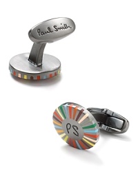 Fancify your dress shirting with handsome cufflinks from Paul Smith, featuring a bright and energetic stripe design. Fancify your dress shirting with handsome cufflinks from Paul Smith, featuring a bright and energetic stripe design.