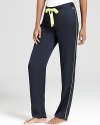 Juicy Couture adds an electric touch to its tumbled satin sleep pants with a neon ribbon drawstring.