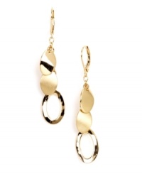 Shake up your style in chic metallic charms. Nine West's gleaming drop earrings feature circular charms in gold tone mixed metal. Approximate drop: 2 inches. Shake up your style in chic metallic charms. Nine West's gleaming drop earrings feature circular charms in gold tone mixed metal. Approximate drop: 2 inches.