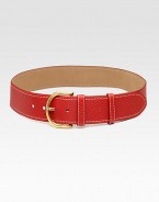 A classic, leather style with a curved, metal buckle and logo stamped belt keeper. Width, about 2Made in Italy