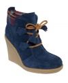 Get a load of that wedge. Tommy Hilfiger's Jade wedge booties feature a suede upper that contrasts dramatically with the light rubber platform and heel.