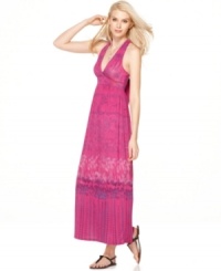 Add some tropical punch to your look with Calvin Klein Jeans' printed maxi dress. Perfect for pairing with summer sandals! Add some tropical punch to your look with Calvin Klein Jeans' printed maxi dress. Perfect for pairing with summer sandals!