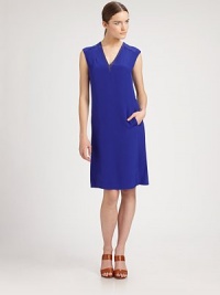 This silky, body-skimming style features a subtly contrast-trimmed V neck and side slash pockets.V necklineSleevelessShoulder seamsSide slash pocketsBack dartsConcealed back zipSilk liningAbout 25 from natural waist68% acetate/32% silkDry cleanMade in Italy of imported fabricModel shown is 5'11½ (181cm) wearing US size 4. This silky, body-skimming style features a subtly contrast-trimmed V neck and side slash pockets.V necklineSleevelessShoulder seamsSide slash pocketsBack dartsConcealed back zipSilk liningAbout 25 from natural waist68% acetate/32% silkDry cleanMade in Italy of imported fabricModel shown is 5'11½ (181cm) wearing US size 4.