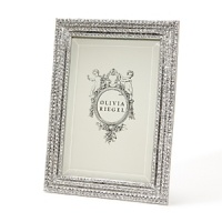 Crystal Pave Frames by Olivia Riegel. Modern and dazzling pave frame embellished with hand-set Swarovski crystals in a silver-tone metal finish. Crystal Pave Frames by Olivia Riegel. Modern and dazzling pave frame embellished with hand-set Swarovski crystals in a silver-tone metal finish.
