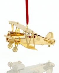 Help your Christmas celebration take off with the intricately detailed, gold-plated First Flight ornament from ChemArt. Help your Christmas celebration take off with the intricately detailed, gold-plated First Flight ornament from ChemArt.