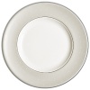 The embodiment of simplicity and grace, platinum bands and pure white stitches with raised dots adorn a pearlescent linen border. Inspired by the silk fabrics in Monique's evening gown designs, pearlized blue and tan accent colors create a look that is both elegant and beautifully serene.