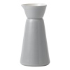 Soft gray contrasts warmly with a rich cream hue, giving this versatile carafe from Vera Wang an earthy, understated elegance.