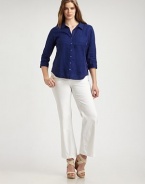 From its chic, three-quarter sleeves to its ultra-feminine, curved hem, you will adore this classic button-down shirt made from soft, lightweight linen. Collar neckThree-quarter sleevesButton frontPatch pocketsCurved hemBack yokeAbout 26 from shoulder to hemLinenMachine washImported
