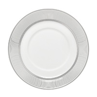 World-renowned fashion designer Monique Lhuillier collaborated with Waterford to create this fine bone china dinnerware collection. Drawing inspiration from the artful details that finish Lhuillier's brilliant couture bridal gowns, each piece in the assortment is decorated with polished platinum accents in a raised stitching design. World-renowned fashion designer Monique Lhuillier collaborated with Waterford to create this fine bone china dinnerware collection. Drawing inspiration from the artful details that finish Lhuillier's brilliant couture bridal gowns, each piece in the assortment is decorated with polished platinum accents in a raised stitching design.