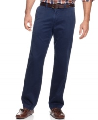 Take it down a notch. Keep your work look comfortable but still classy with these flat-front chino pants from Tommy Bahama.