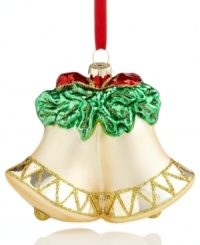 Jingle all the way! A pair of bells ring in the season with holiday cheer in this lovely glass ornament embellished with gold glitter for a touch of sparkle. Jingle all the way! A pair of bells ring in the season with holiday cheer in this lovely glass ornament embellished with gold glitter for a touch of sparkle.