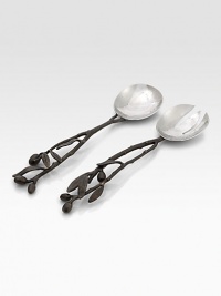 This hand-crafted serving set features the olive branch, symbolizing peace, hope and good will. One of the most iconic designs from America's foremost metal artist. From the Olive Branch CollectionSet of twoOxidized stainless steelAbout 11½ longHand washImported