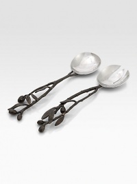 This hand-crafted serving set features the olive branch, symbolizing peace, hope and good will. One of the most iconic designs from America's foremost metal artist. From the Olive Branch CollectionSet of twoOxidized stainless steelAbout 11½ longHand washImported This hand-crafted serving set features the olive branch, symbolizing peace, hope and good will. One of the most iconic designs from America's foremost metal artist. From the Olive Branch CollectionSet of twoOxidized stainless steelAbout 11½ longHand washImported