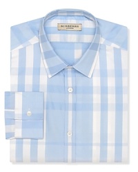 In pale city blue, the Treyforth dress shirt showcases Burberry's signature check print. In pale city blue, the Treyforth dress shirt showcases Burberry's signature check print.