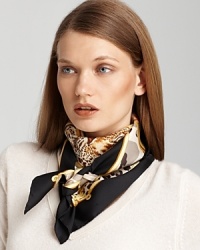 A safari-inspired scarf with stunning illustrations and a bold black border. A safari-inspired scarf with stunning illustrations and a bold black border.