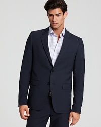 Two button, notched lapel sport coat. Front flap pockets and chest pocket. Slim fit, with a slight stretch, for a sleek body-hugging silhouette. Two button, notched lapel sport coat. Front flap pockets and chest pocket. Slim fit, with a slight stretch, for a sleek body-hugging silhouette.