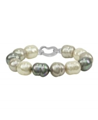 A classic, reinvented by Majorica. Gray, nuage and white man-made baroque pearls (14 mm) go from casual to cocktails with ease. Bracelet crafted from sterling silver. Approximate length: 7 inches. A classic, reinvented by Majorica. Gray, nuage and white man-made baroque pearls (14 mm) go from casual to cocktails with ease. Bracelet crafted from sterling silver. Approximate length: 7 inches.