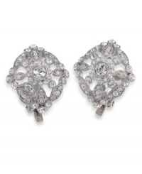 Dare to be dramatic. These large crystal earrings by Carolee feature an intricate square-shaped pattern set in silver tone mixed metal with clip on backing. Approximate diameter: 7/8 inch. Dare to be dramatic. These large crystal earrings by Carolee feature an intricate square-shaped pattern set in silver tone mixed metal with clip on backing. Approximate diameter: 7/8 inch.