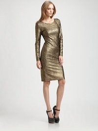 Liquid gold pours over the body in a fitted sheath styled with a sleek mesh back and peek-a-boo cutouts.FittedBoatneckLong sleevesFlat frontCenter back zipperBack slitAbout 23 from natural waistPolyesterDry cleanImportedModel shown is 5'9 (175cm) wearing US size Small. Liquid gold pours over the body in a fitted sheath styled with a sleek mesh back and peek-a-boo cutouts.FittedBoatneckLong sleevesFlat frontCenter back zipperBack slitAbout 23 from natural waistPolyesterDry cleanImportedModel shown is 5'9 (175cm) wearing US size Small.