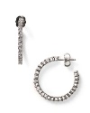 Crystal-studded hoops make a powerful impact. From Crislu, with fine cubic zirconia set in sterling and platinum.