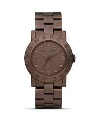 Opt for a piece of designer arm candy. In this season's must-have shade, MARC BY MARC JACOBS' chocolate chronograph is a sweet way to update your look. Opt for a piece of designer arm candy. In this season's must-have shade, MARC BY MARC JACOBS' chocolate chronograph is a sweet way to update your look.