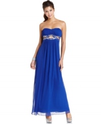 Delicate pleats assemble gracefully on this strapless gown from Roberta, while bodice cutouts and twinkling rhinestones lend pretty, red-carpet style. Delicate pleats assemble gracefully on this strapless gown from Roberta, while bodice cutouts and twinkling rhinestones lend pretty, red-carpet style.