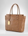 Sized right for office to off-duty, this Lauren Ralph Lauren tote is classically crafted in leather with a spacious interior and an easy access exterior pocket.