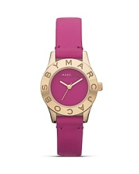 Perfect playful accessorizing with this watch from MARC BY MARC JACOBS. With a soft matte leather band and logo-engraved bezel, this piece has style-setter written all over it. Perfect playful accessorizing with this watch from MARC BY MARC JACOBS. With a soft matte leather band and logo-engraved bezel, this piece has style-setter written all over it.